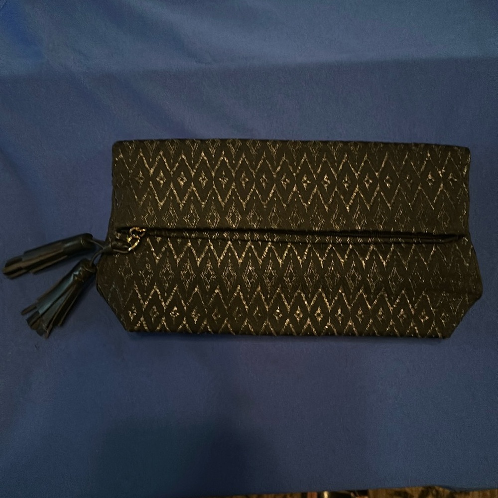 Nine West magnetic clutch
